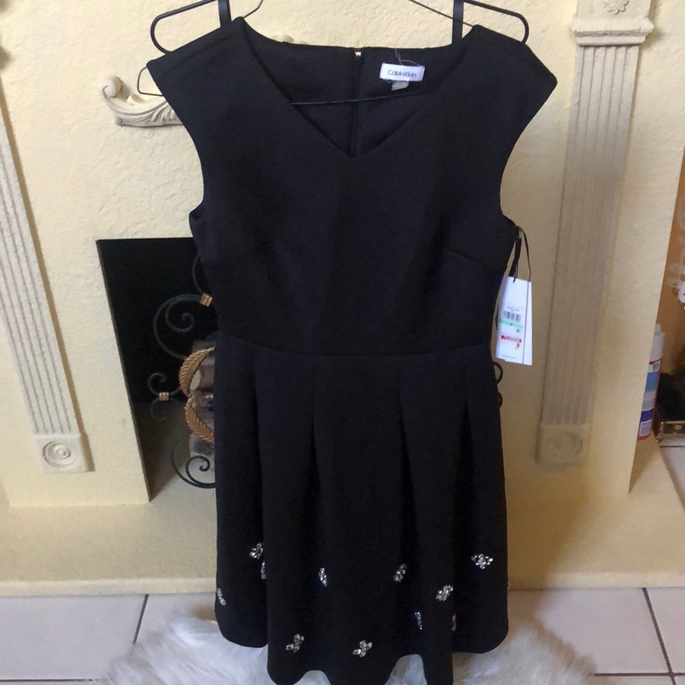 Calvin Klein Women's Sleeveless Fit and Flare Dress with Rhinestone Skirt